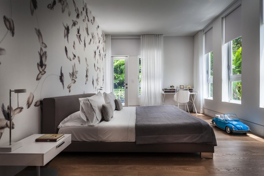 The bedrooms boast natural hardwood floors