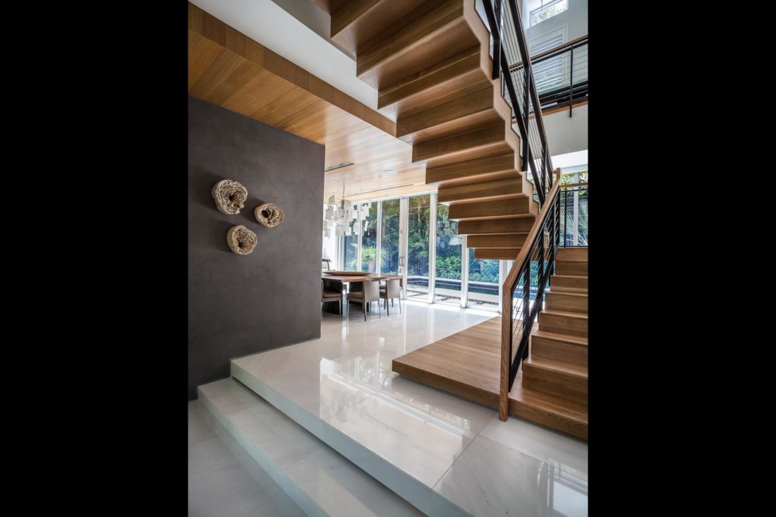 Wood staircase design adds to the open feel